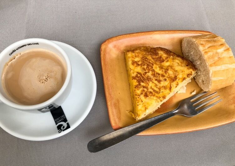 Spanish omelet with a cup of coffee