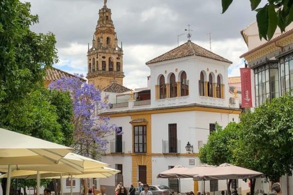 pretty streets in Cordoba with Mezquita in background