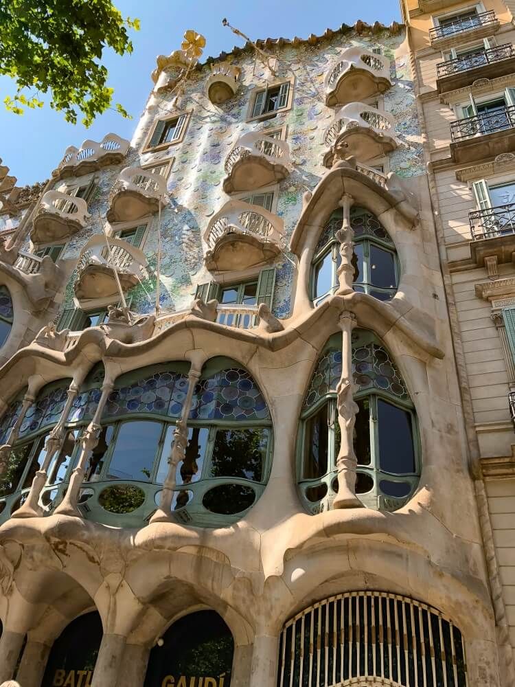 bottom view of Casa Batllo looming above