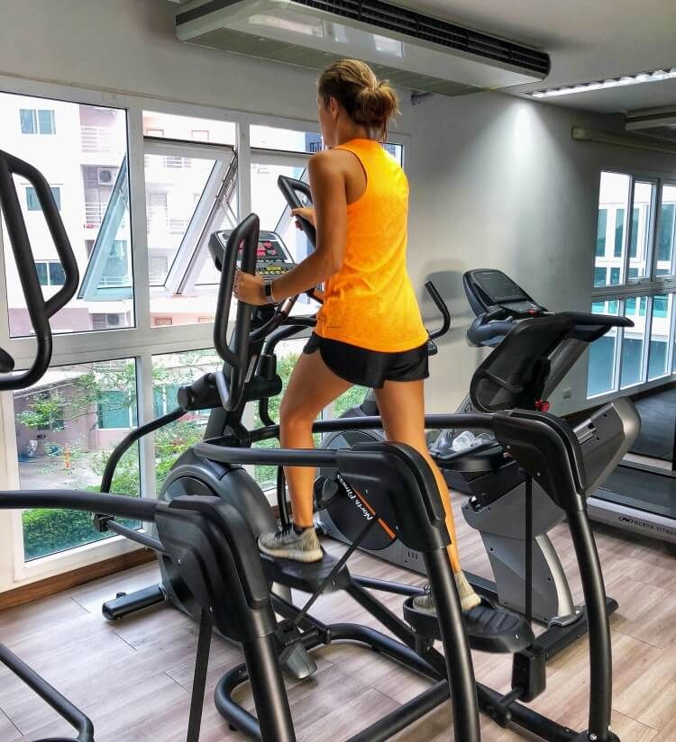 Kristen working out on elliptical travel fitness