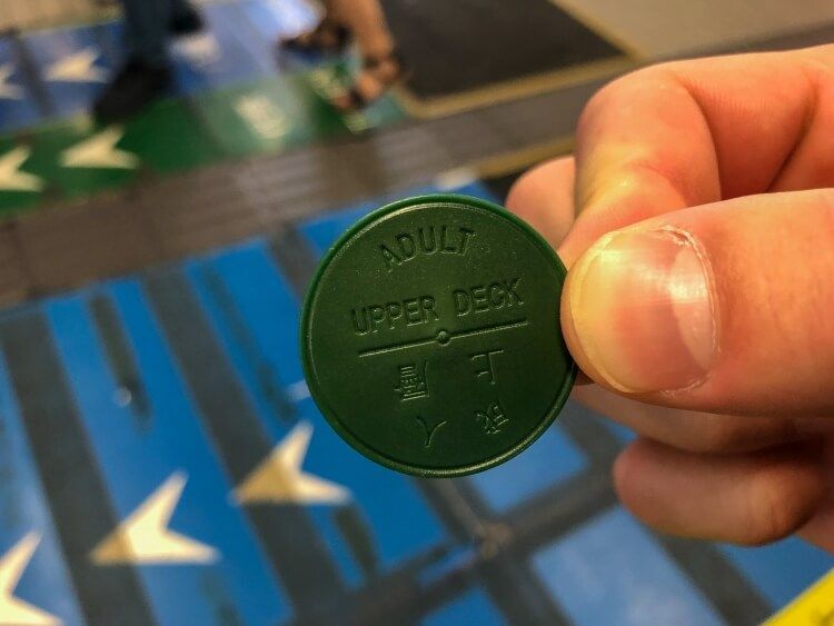 A coin allowing entry on the star ferry as something to do in Hong Kong