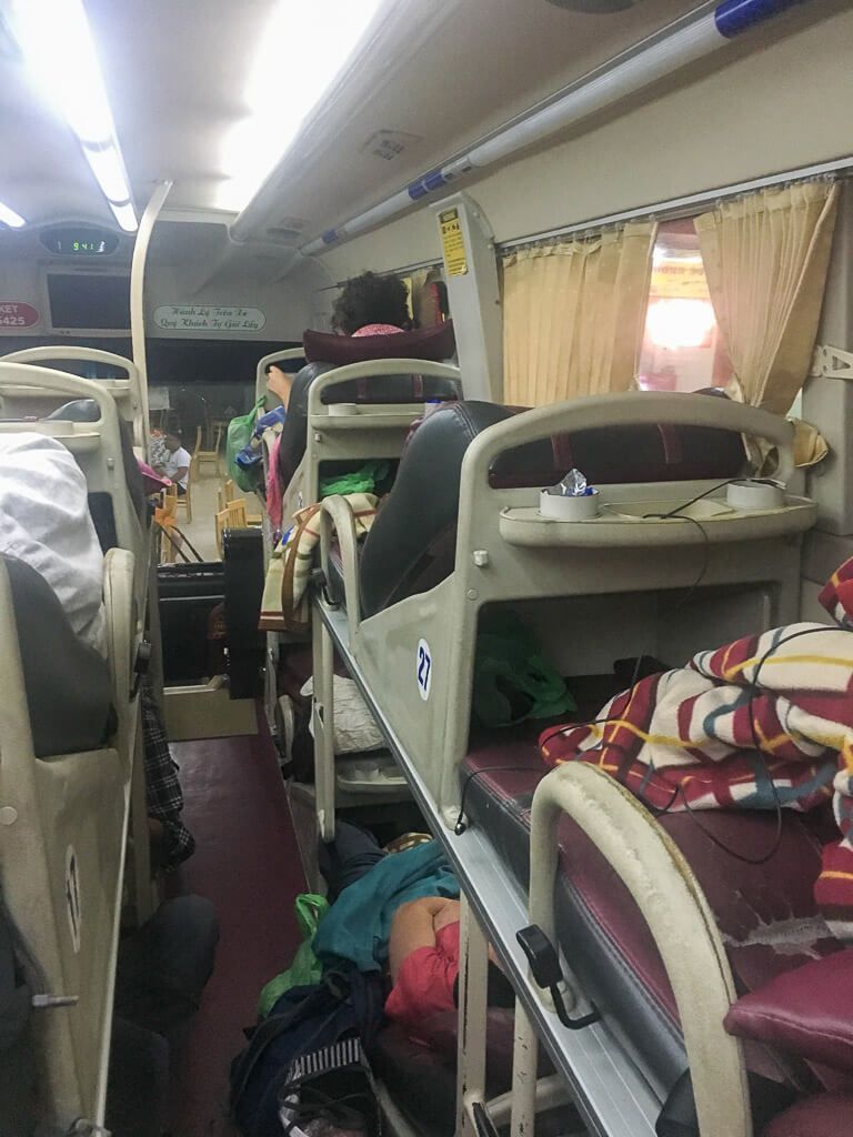 Tourists sleeping on sleeper bus in Vietnam