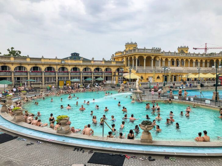 one of three szechenyi baths outdoor pools crowded