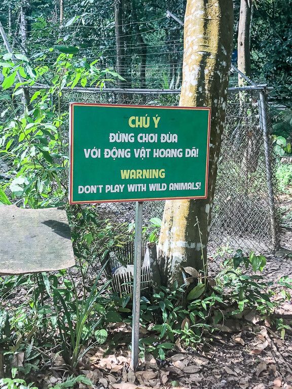 A sign indicating not to play with the wild animals inside Phong Nha botanical garden