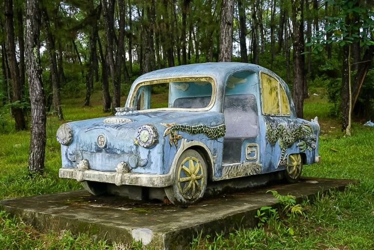 abandoned water park hue old blue stone car