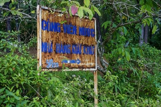 badly rusted old sign in water park hue