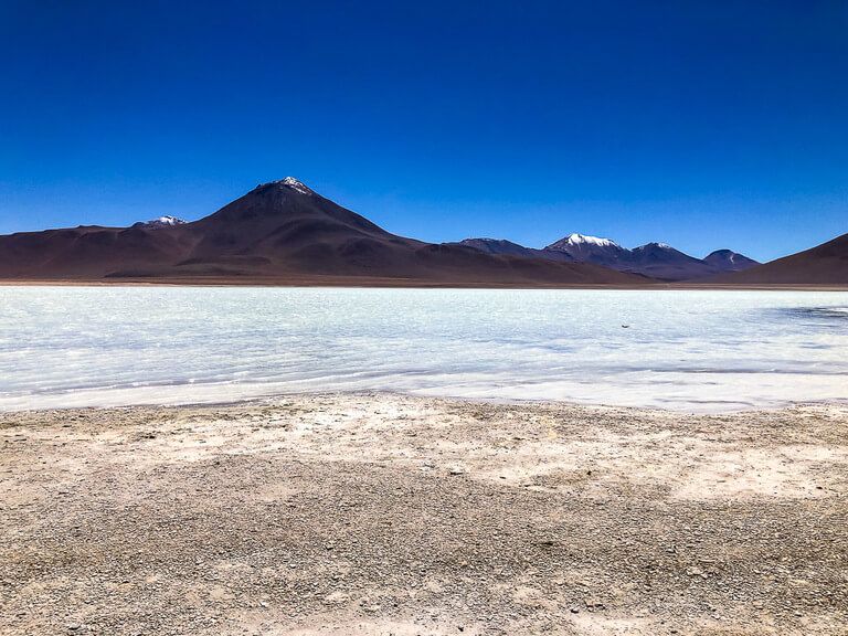 salt flat with volcano backdrop best things to do in San Pedro de atacama