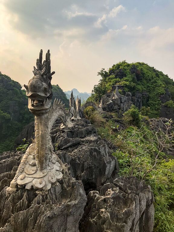 Stone dragon at the summit of Mua Cave Ninh Binh itinerary