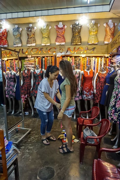Woman having a tailor made romper in central vietnam