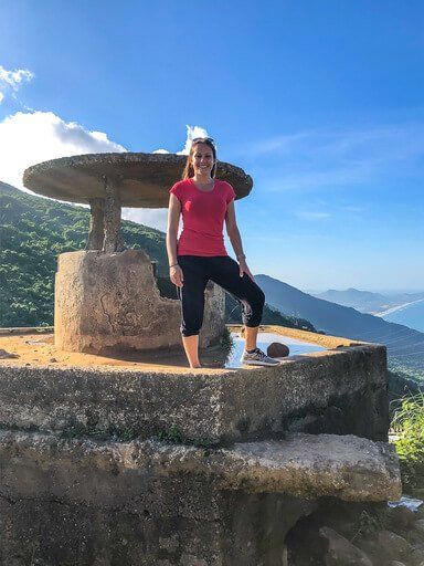 Kristen stood on bunker at top of Hai Van Pass Vietnam