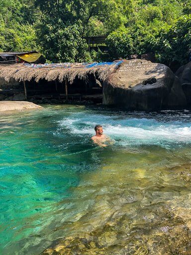 Mark swimming in elephant spring Vietnam