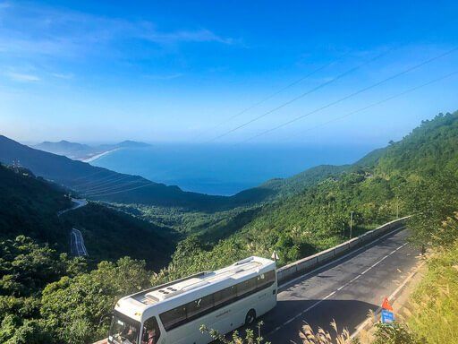 Tourist bus on scenic hai van pass route
