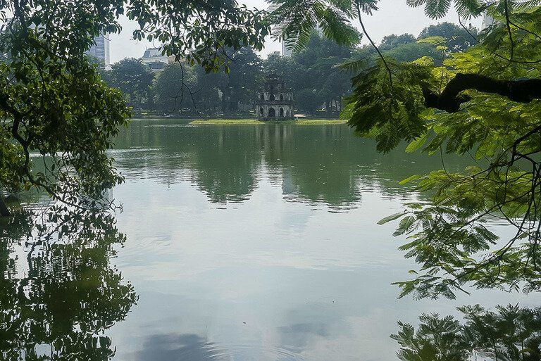 Hoan Kiem lake and turtle tower in Hanoi Vietnam