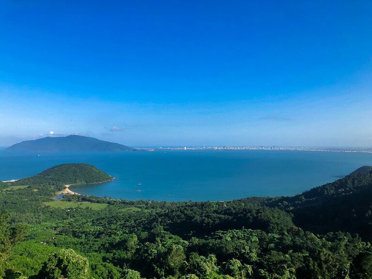 Da nang city across blue water from Hai Van pass on way to Hoi An vietnam