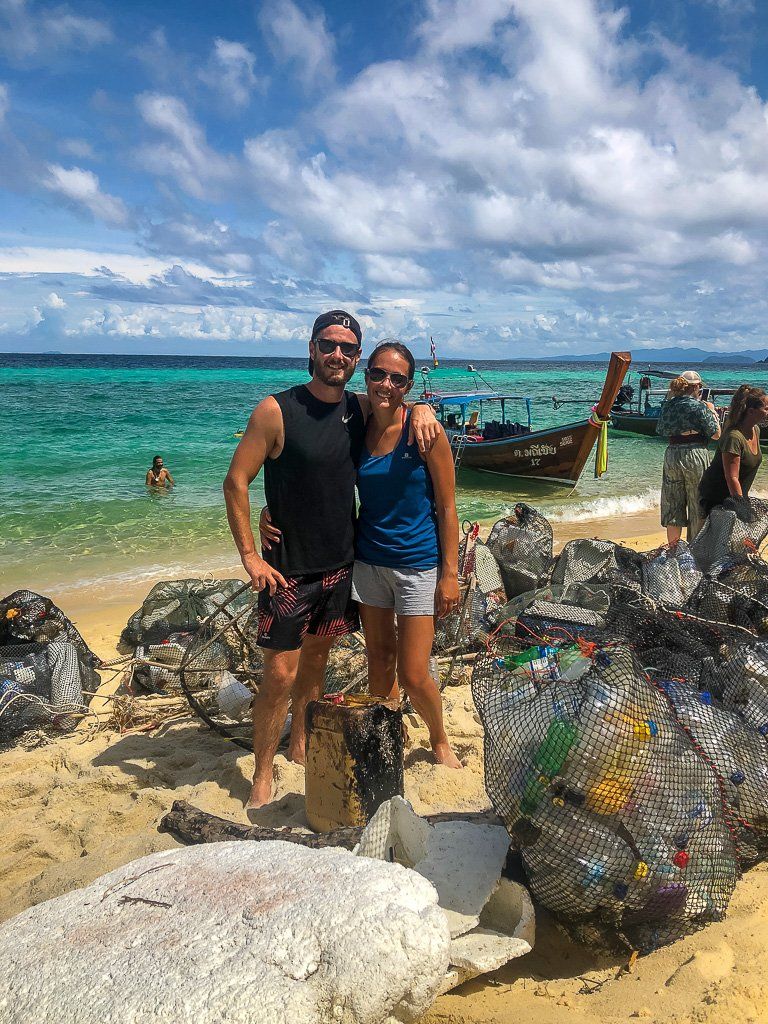 Mark and kristen clearing up plastic bottles in Koh lipe thailand