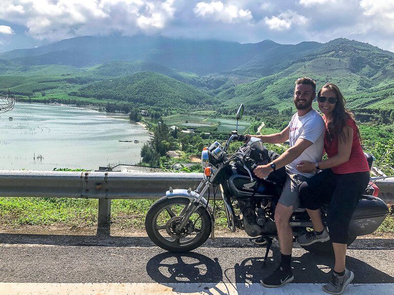 Mark and kristen on motorbike on hai van pass route