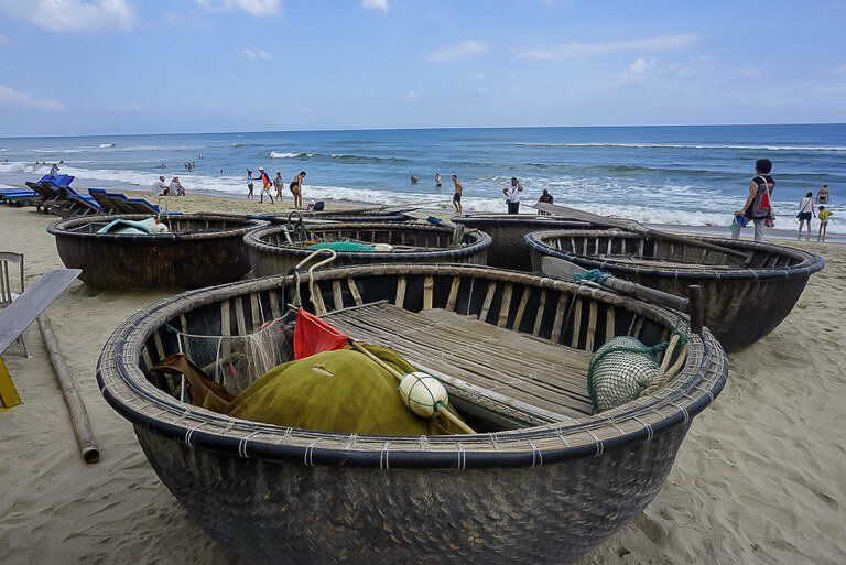 beach in Hoi An with round fishermen baskets save beaches for Thailand