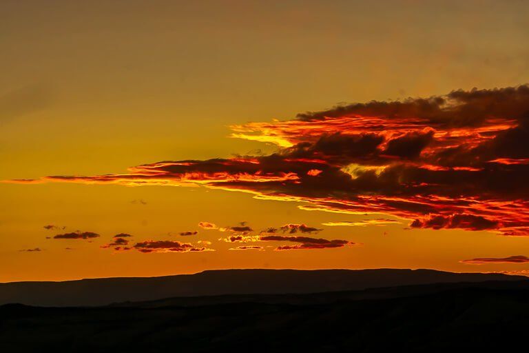 Incredible sunset deep red looks like flames between Capitol Reef and Escalante