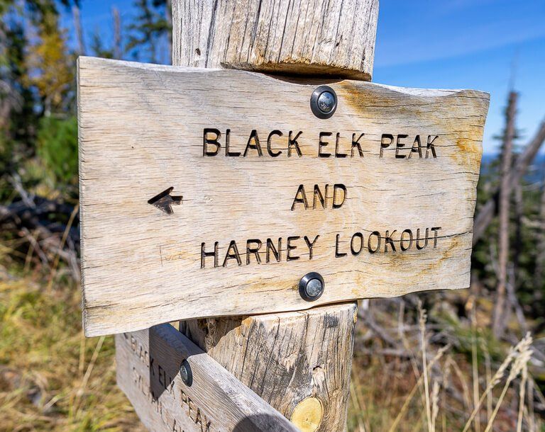 Wooden sign black elk peak hike and Harney lookout