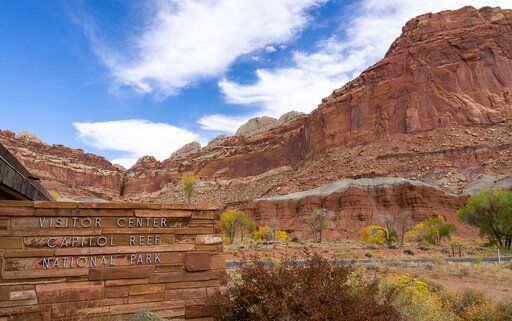 Capitol Reef welcome center with rock behind