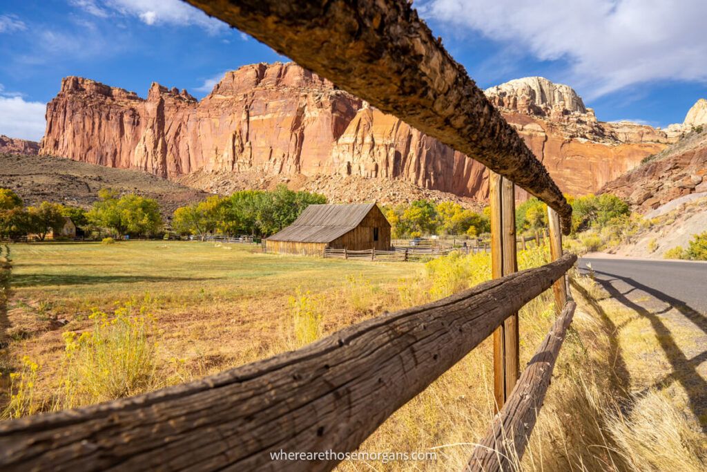 Fruita Barn view through the wooden fence