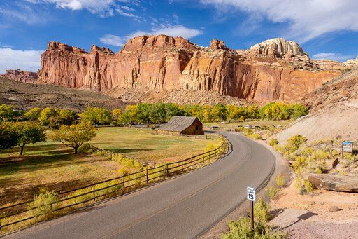 Wide shot of fruita barn from afar Capitol Reef