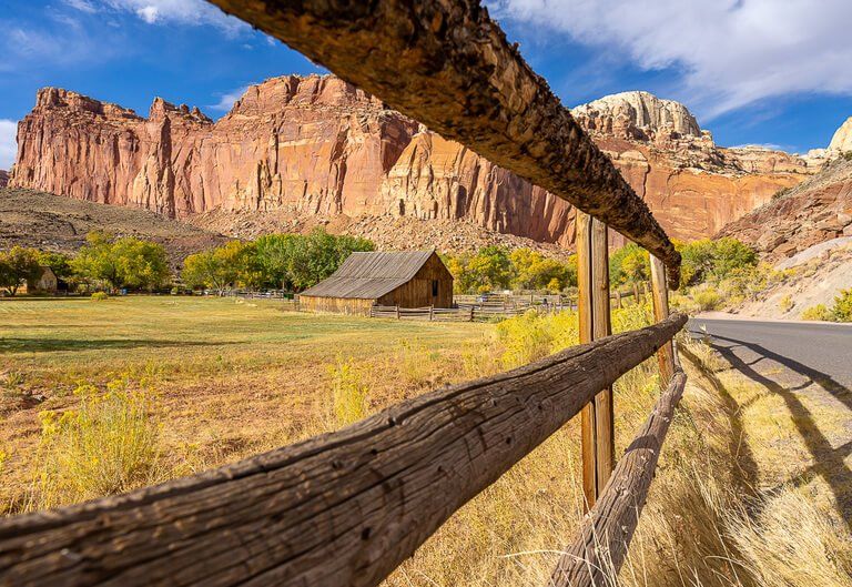 fruita barn on Gifford homestead at Capitol Reef national park through fence view