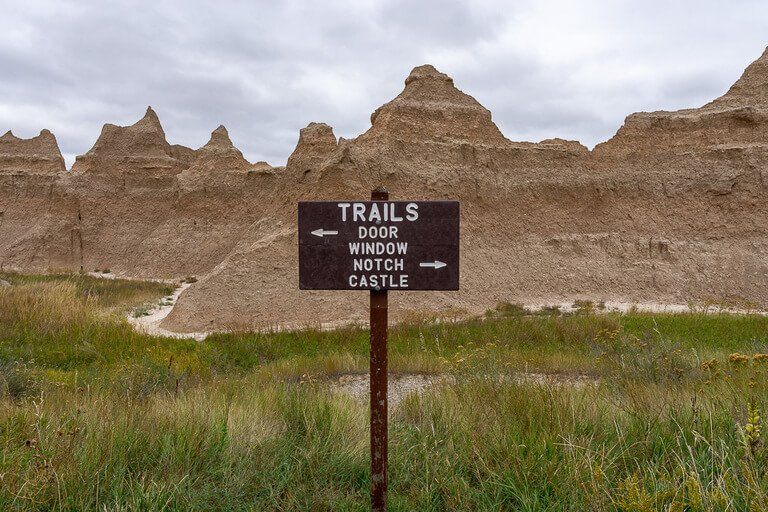 Badlands signpost listing all hiking trails