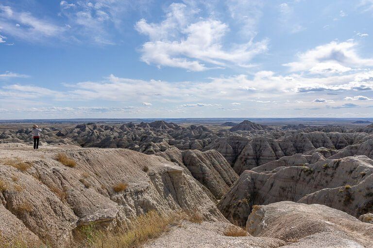 Kristen taking a photo at big badlands overlook South Dakota