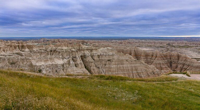 Rainy dark clouds at sunset over badlands national park