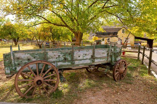 Old green wagon with iron wheels Gifford homestead