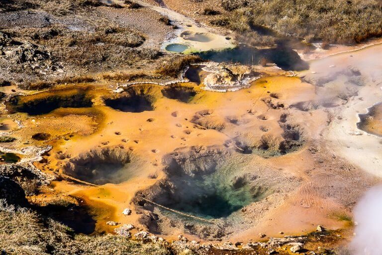 Artists Paint Pot geothermal feature at Yellowstone National Park