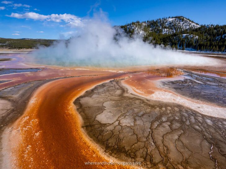 Yellowstone National Park 4 Day Itinerary Best Things to do Ultimate Guide Where Are Those Morgans incredibly vibrant colors swirling around Grand Prismatic Spring on a clear cold day loads of steam billowing