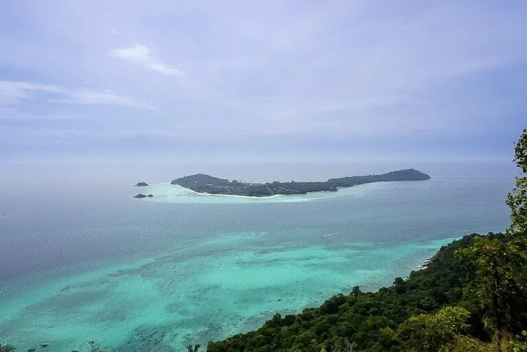 Koh Lipe island from the summit of Koh Adang viewpoint thin clouds in sky turning slightly purple