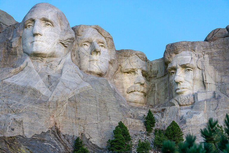 Mount Rushmore at golden hour before sunrise near Keystone South Dakota