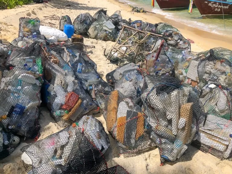 Trash hero project cleaning up rubbish from Thai islands dozens of filled bags