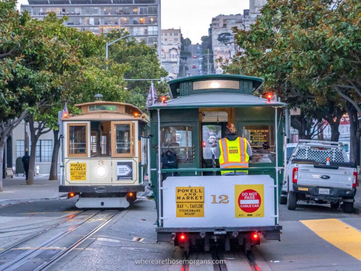 Cable Cars powell and market on parallel tracks with hill ahead one of the most iconic things to do on a San Francisco itinerary