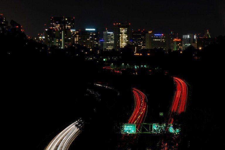 Cabrillo Bridge Balboa park San Diego view of city and cars