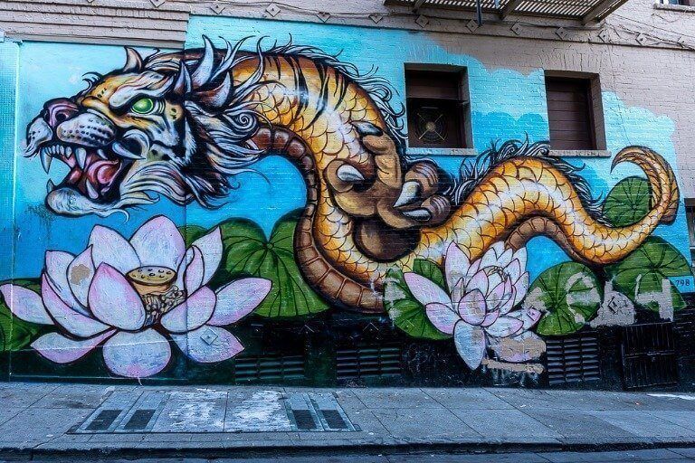 Tiger serpent mural on a wall in San Francisco chinatown
