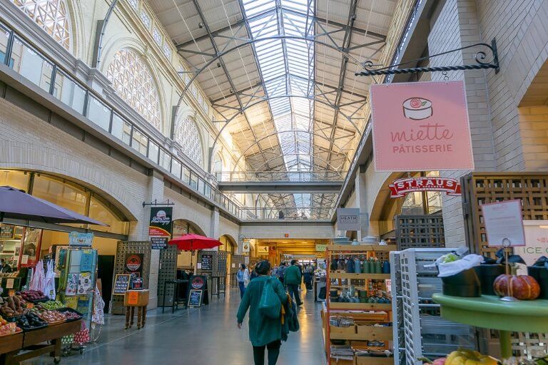 Ferry building and marketplace plus farmers market inside boutique stores and coffee shops