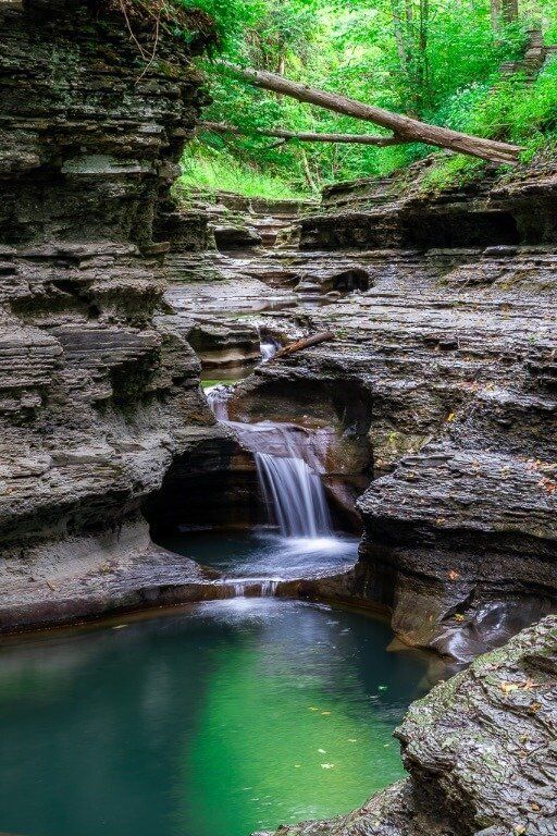 Stunning waterfall and pools on gorge trail in buttermilk falls state park Ithaca ny finger lakes