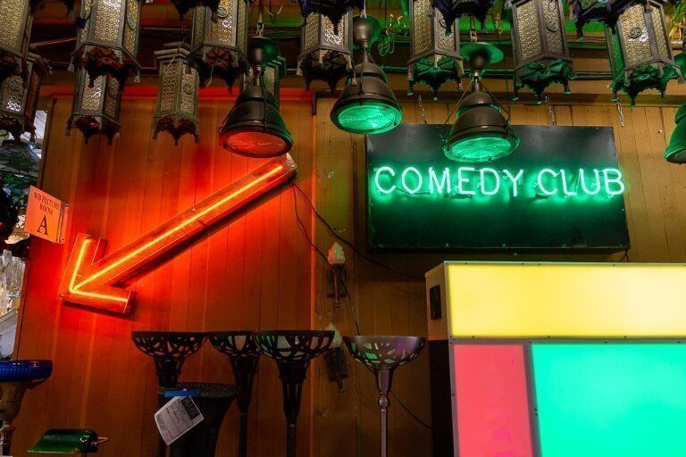 Comedy club neon sign from the joker movie