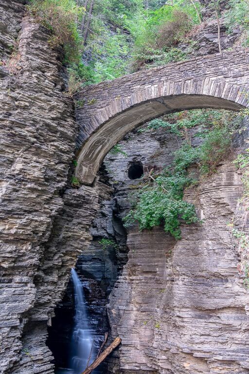 Sentinel Bridge and an enclosed spiral tunnel welcome you to Watkins Glen State Park gorge trail entrance