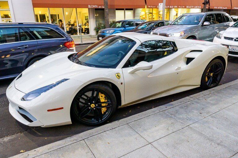 White Ferrari parked on side of road in Beverly Hills California