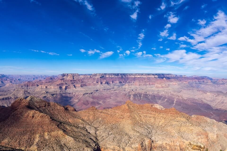 Beautiful contrast between colorful canyon rocks and deep blue sky grand canyon national park arizona