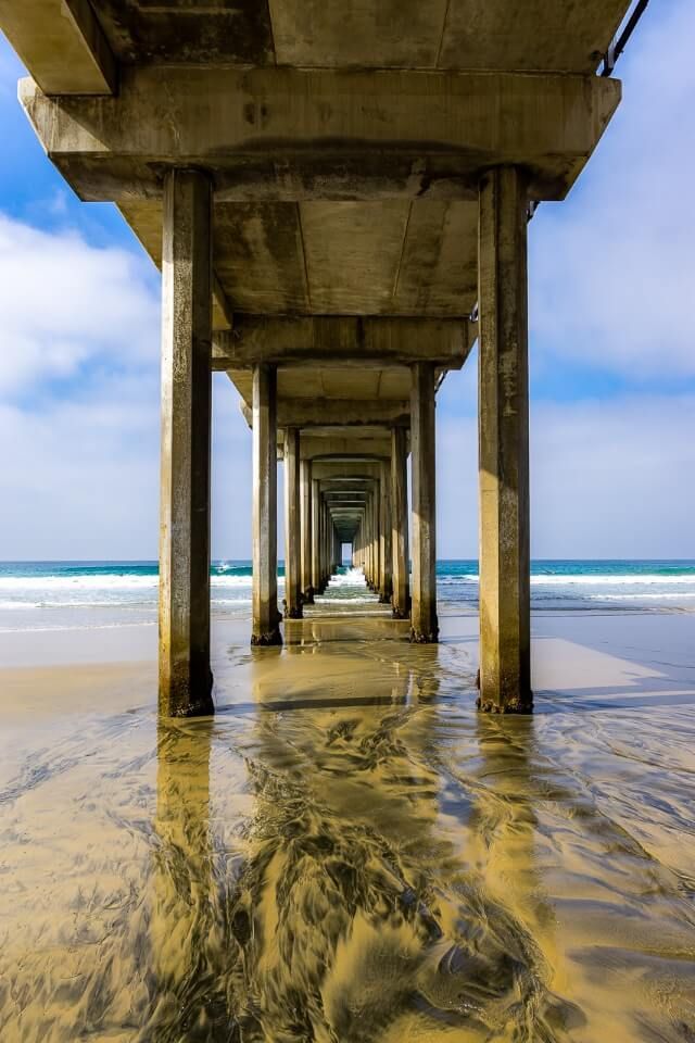 Scripps Oceanography Ellen Browning Pier on a beach in San Diego California columns look like a tunnel awesome travel photography