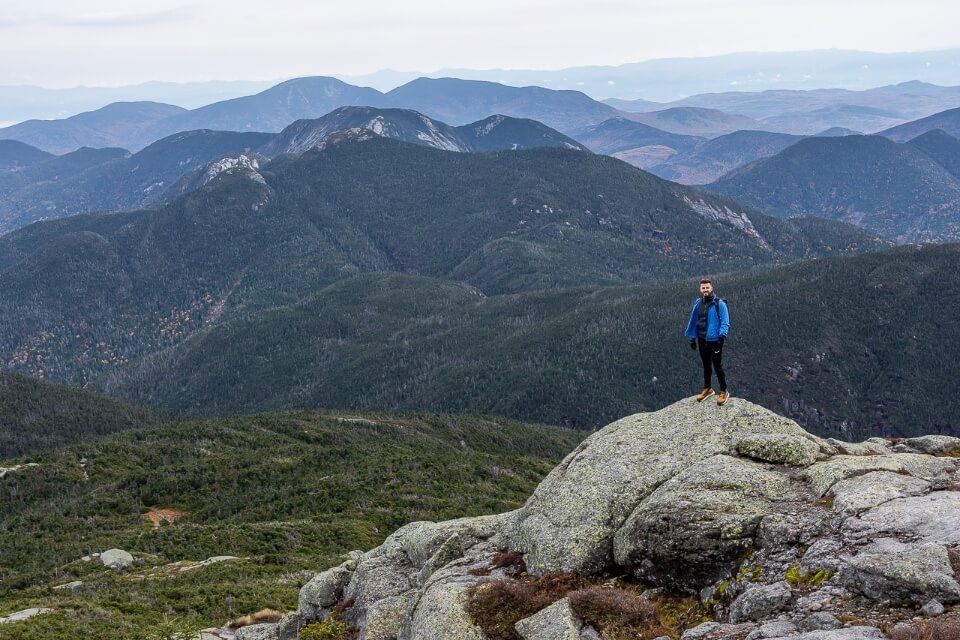 Mark at the summit of Mount Marcy hike in new york adirondacks mountains awesome rolling mountains picture of america