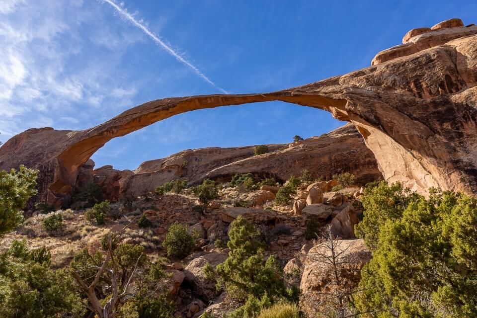 Landscape arch on devils garden trail hike arches national park utah usa long thin arch with deep blue sky behind