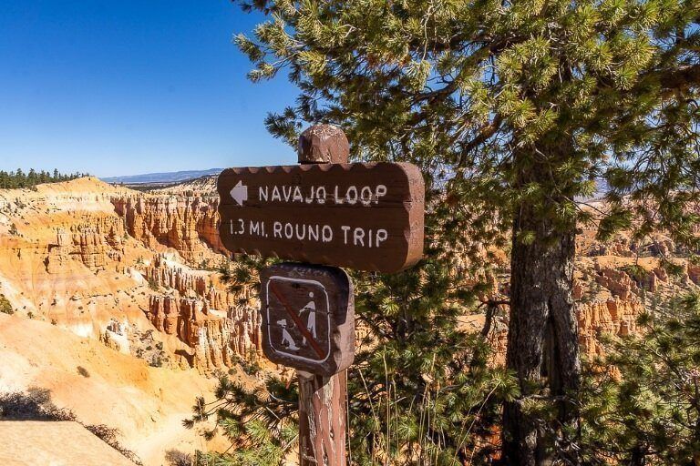 Sign indicating direction to a walk in utah