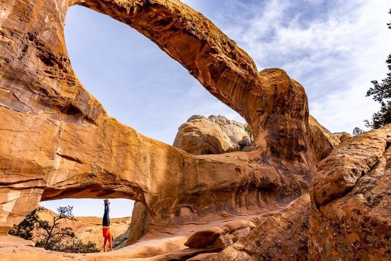 Double O Arch impressive natural sandstone rock formation in arches national park utah along devil's garden trail hike